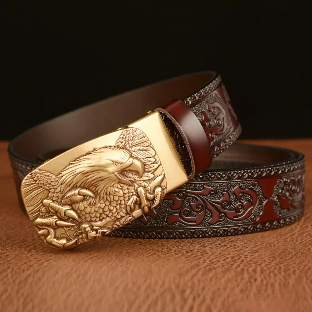 Embossed brown leather belt featuring an eagle buckle for a sophisticated look