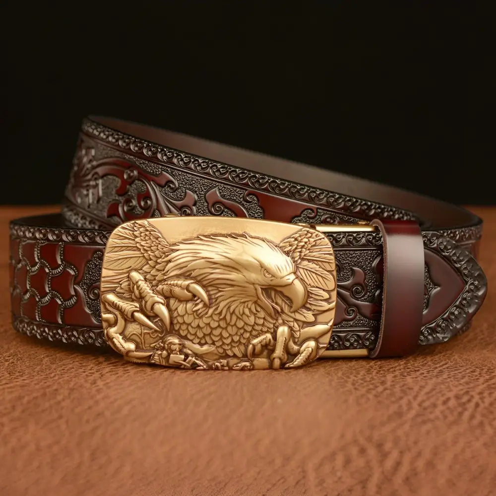 Embossed brown leather belt featuring a detailed eagle-shaped buckle for stylish wear