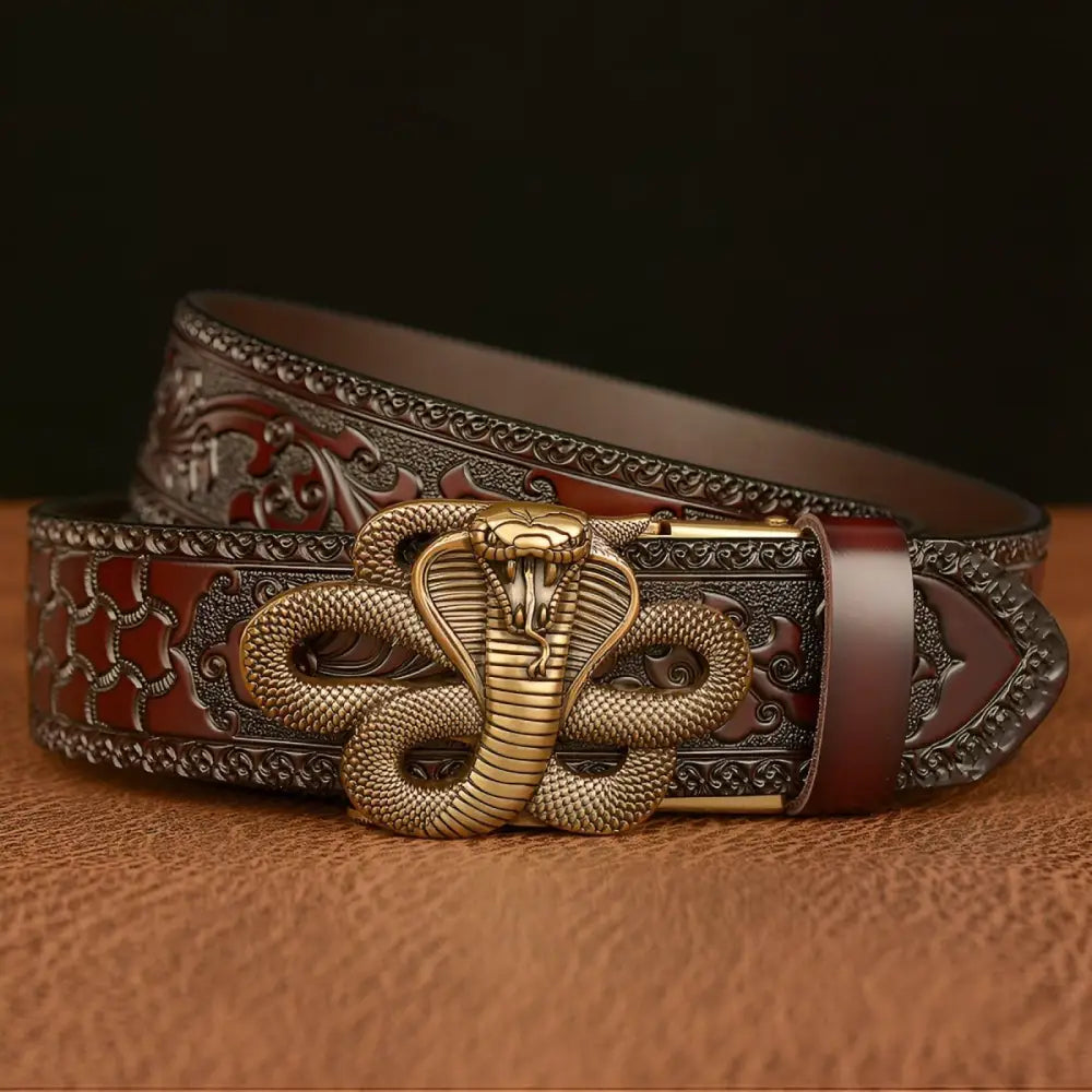 Embossed leather spirit animal belt with cobra buckle showcasing intricate animal design