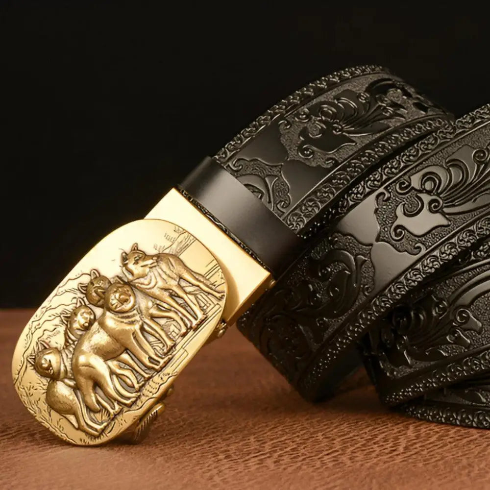 Embossed black leather belt with wolf pack motif and gold animal spirit buckle
