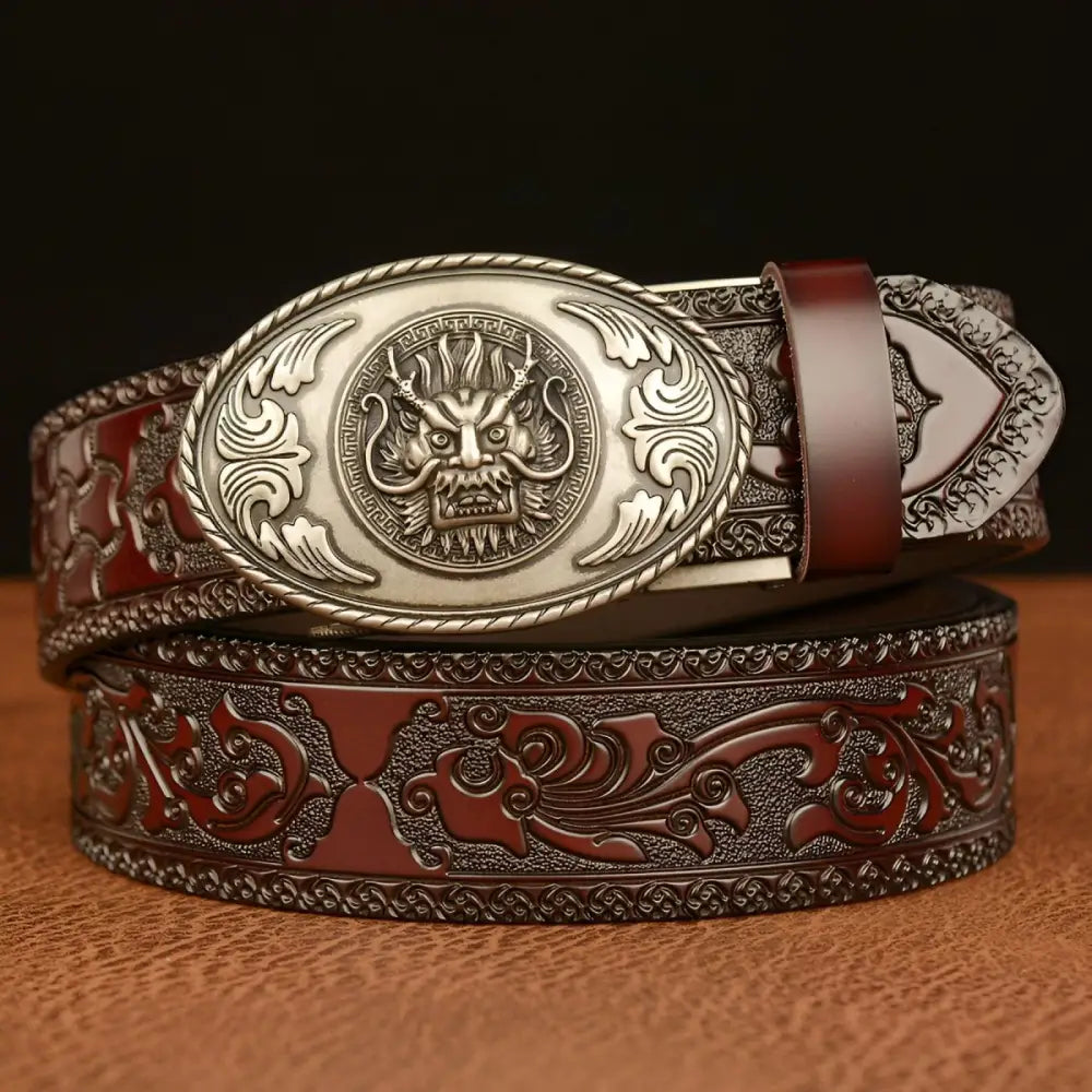 Embossed leather belt featuring a dragon head motif and zoological-inspired buckle