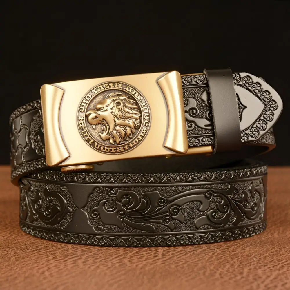 Embossed black leather belt with lion’s head motif and intricate embossed design