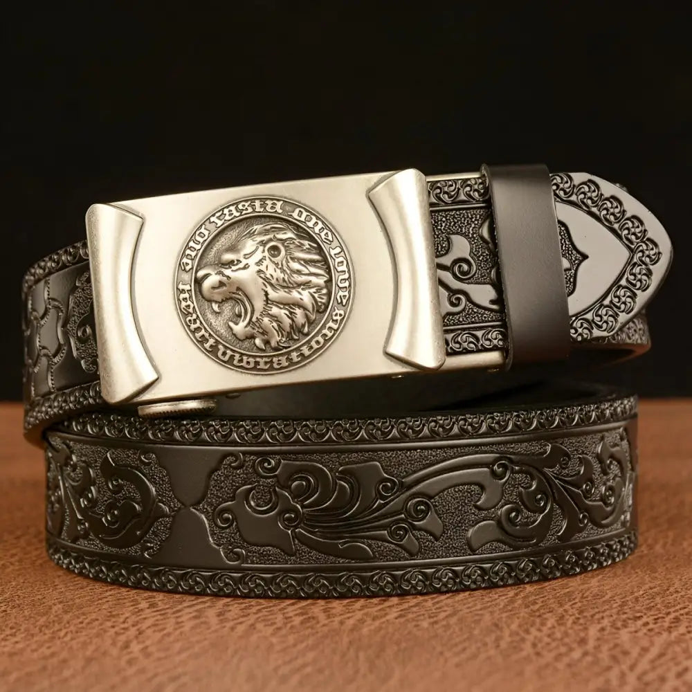 Embossed leather belt featuring a lion’s head motif and intricate head design