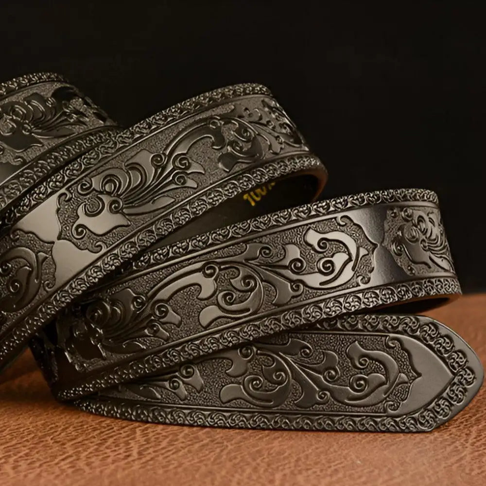 Ornate black leather belt featuring lion’s head motif and embossed design
