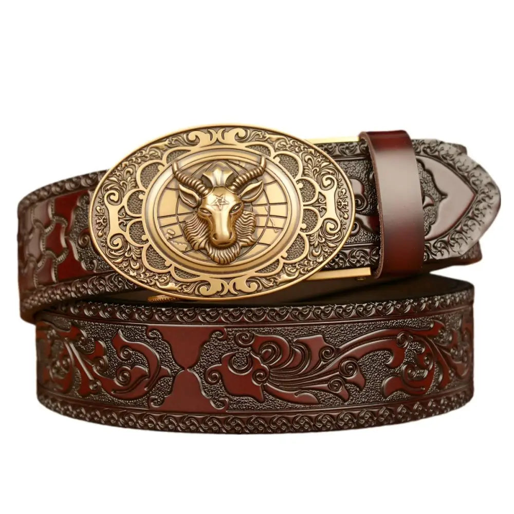 Embossed black leather Cody Belt with ornate gold ram buckle for stylish accessories