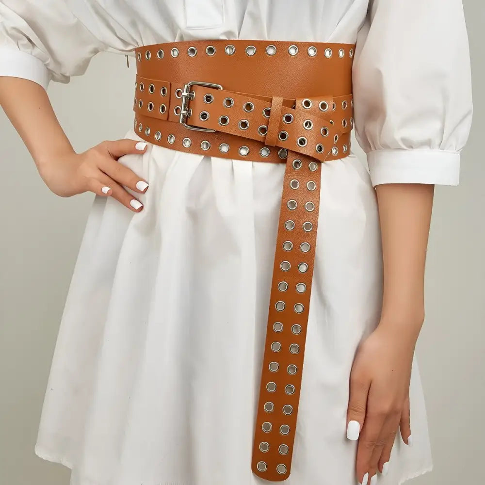 Brown grommet-studded waist belt from XXL Oriane Belt with grommet detailing