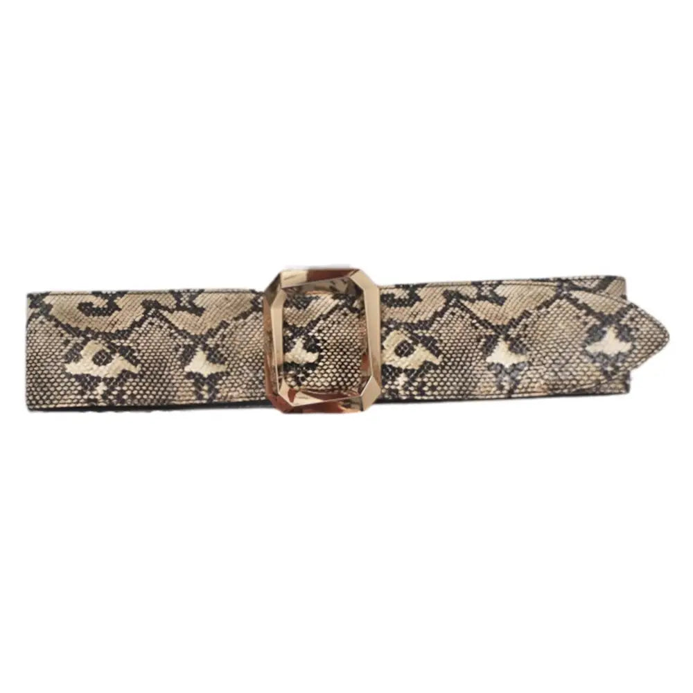Snakeskin-patterned leopard print belt with jeweled gold buckle for stylish black dresses