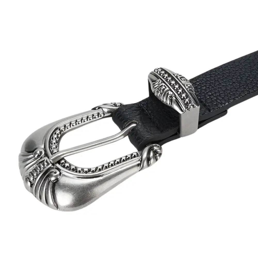 Black leather belt with ornate silver buckle and decorative accents