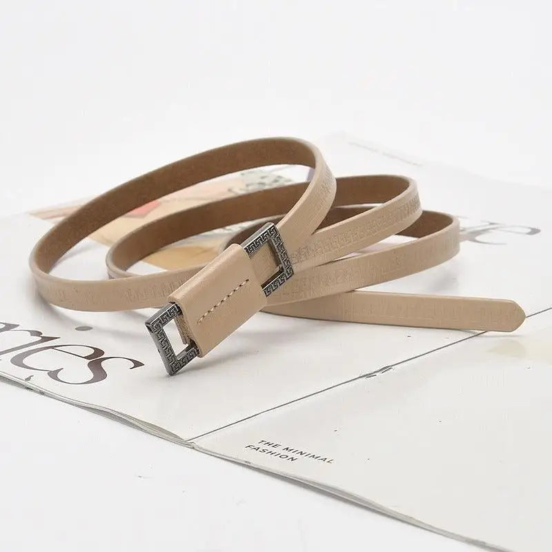 Beige leather belt with a square buckle from Assorted Leather Belts with Decorative Buckles