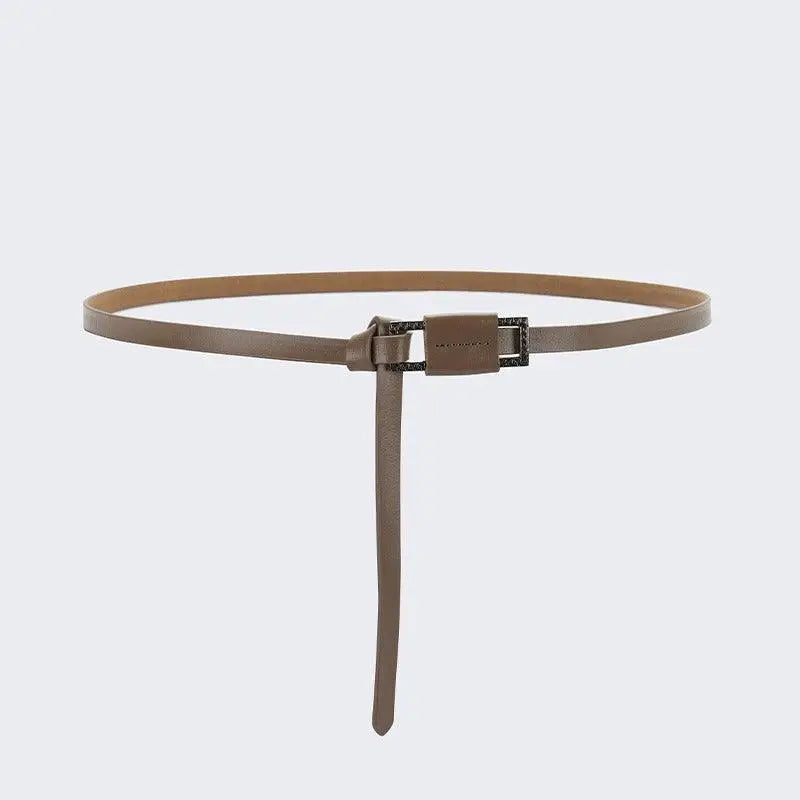Taupe-colored leather belt with decorative buckle from Assorted Leather Belts collection