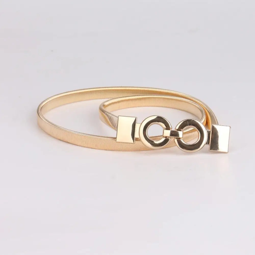 Gold belt with circular interlocking buckle for elegant style and sophisticated look