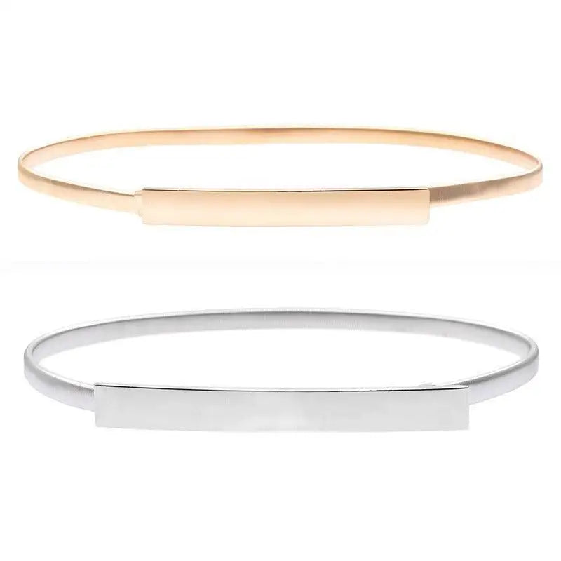 Gold and silver metal belts from Dhoxia Slim Belt with elegant gold-toned buckle