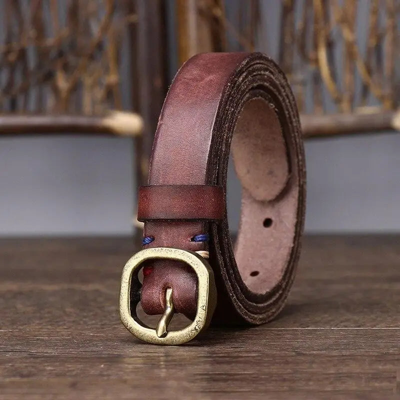 Assorted Green Leather Belts with Brass Buckles featuring a rolled brown leather belt with brass buckle