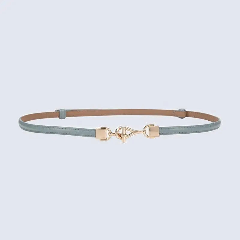 Shaqi Model Belt featuring a thin leather design with decorative gold buckle