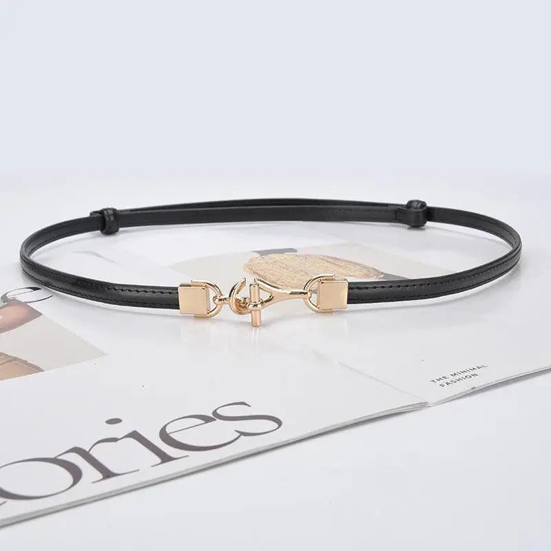 Black leather Shaqi Model Belt with decorative gold buckle for stylish accessory