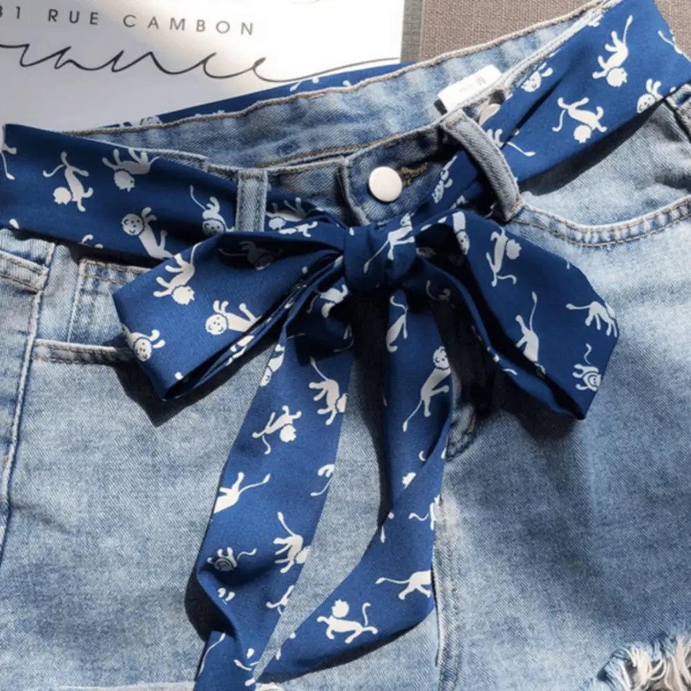Blue denim shorts with jehofa scarf belt featuring monkey print and woven polyester material
