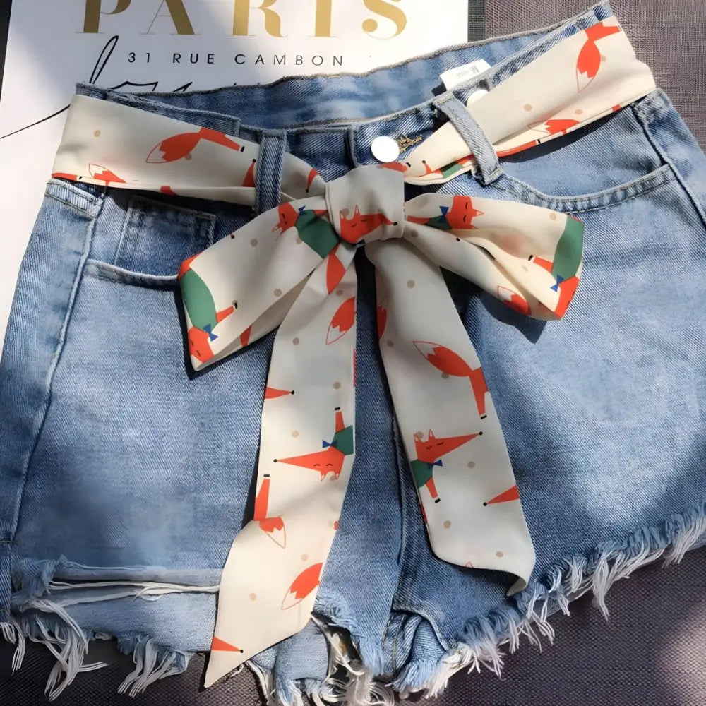 Denim shorts with a fox-patterned sash accessory from Fashionable Denim Outfits collection