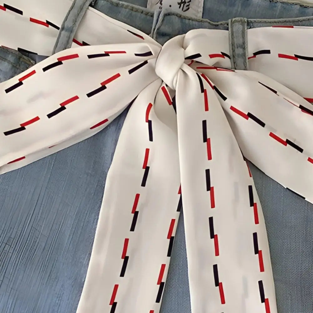 White belt with red and black dashes tied in a bow, Lento Scarf Belt for casual style