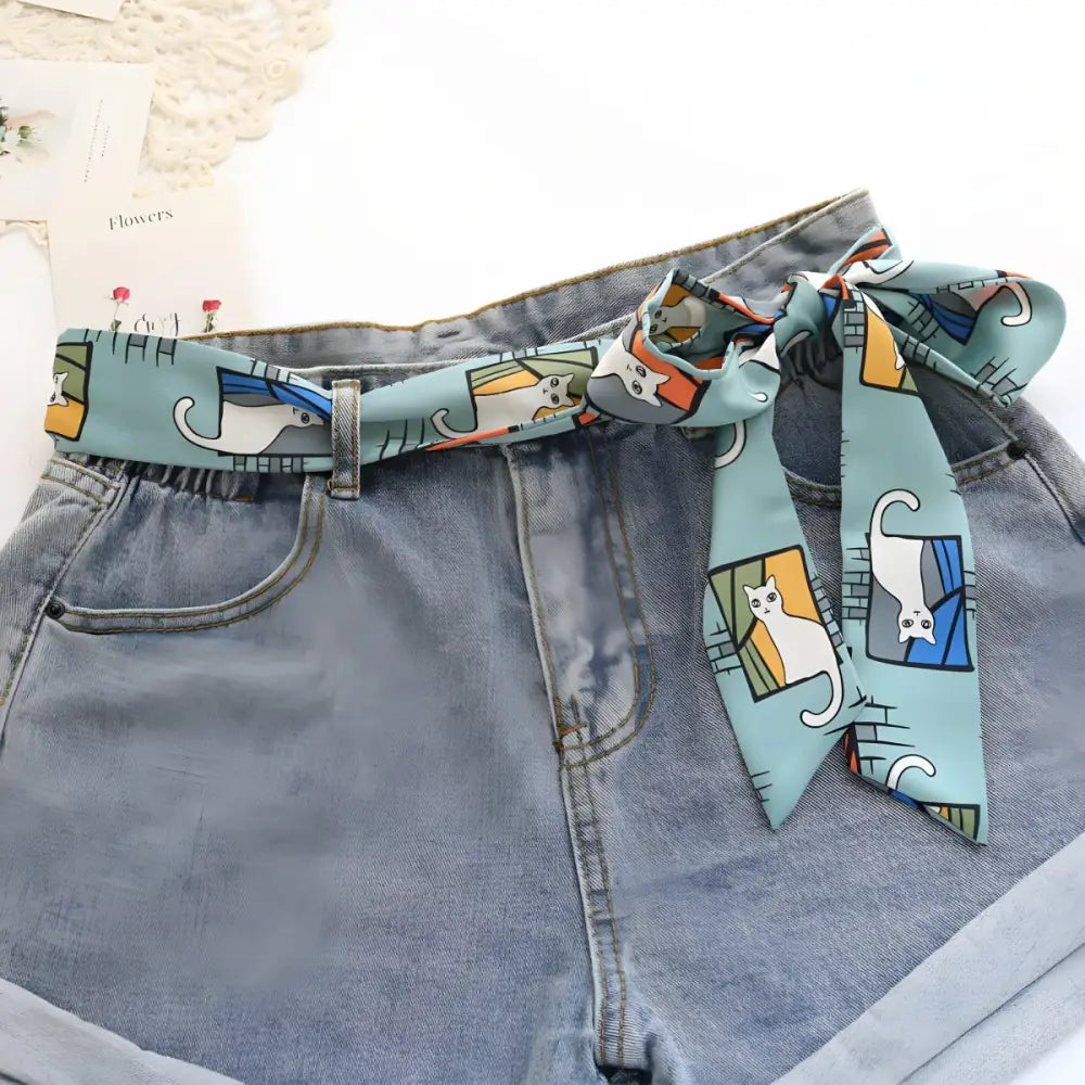 Denim shorts with Cat Patterned Eutalia Scarf Belt for stylish accessory addition