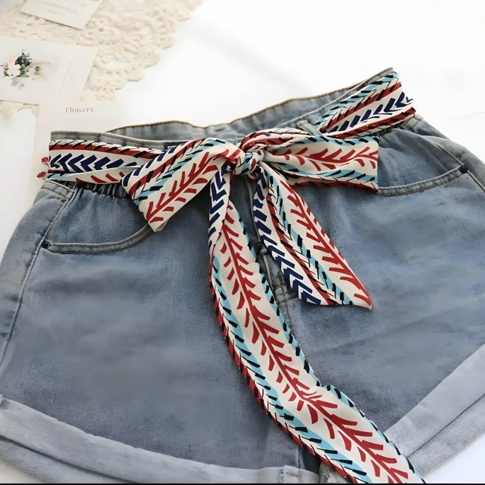 Denim shorts with patterned tie belt featuring Molino Scarf Belt for stylish summer wear