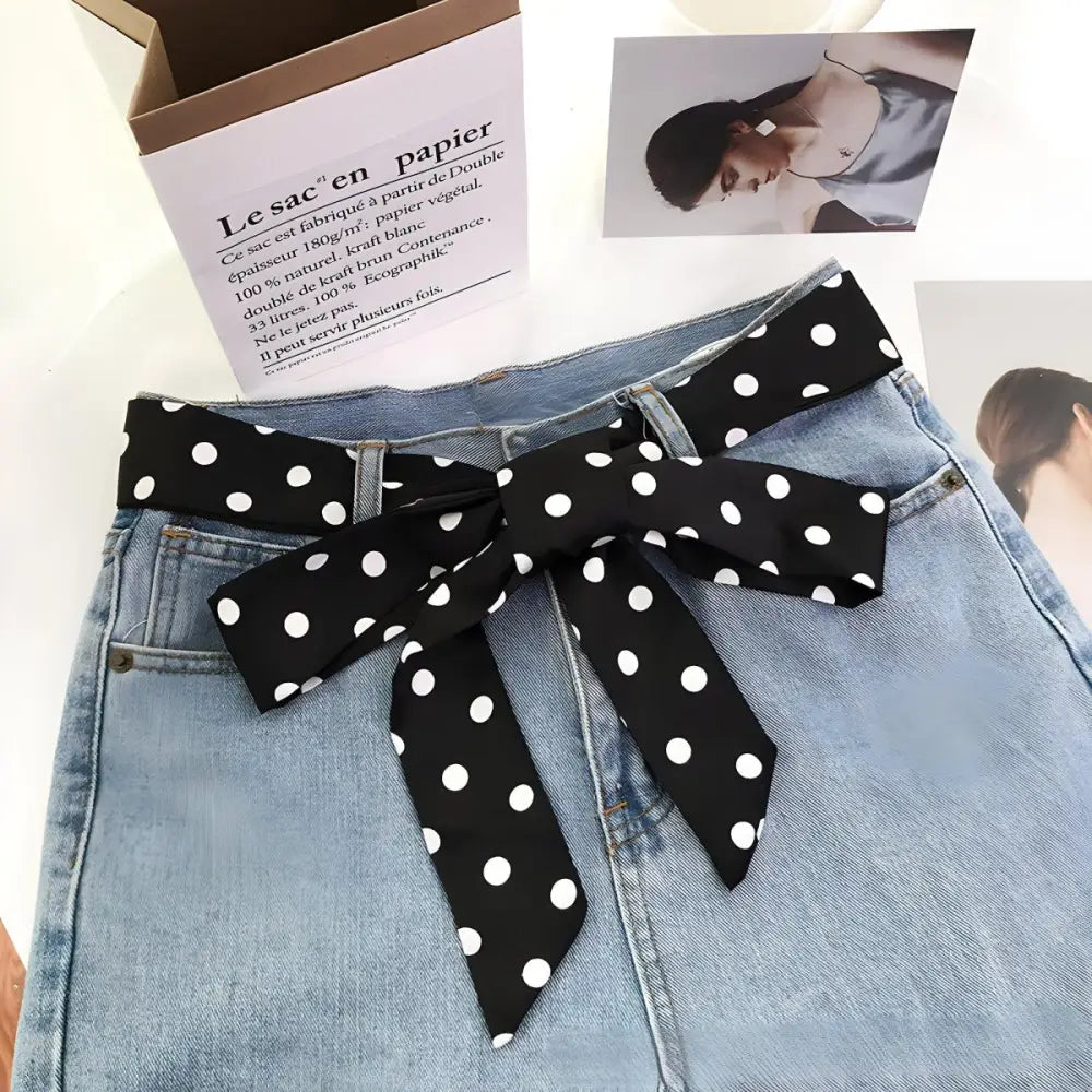 Light blue denim skirt with polka dot scarf belt and stylish polka dot accents