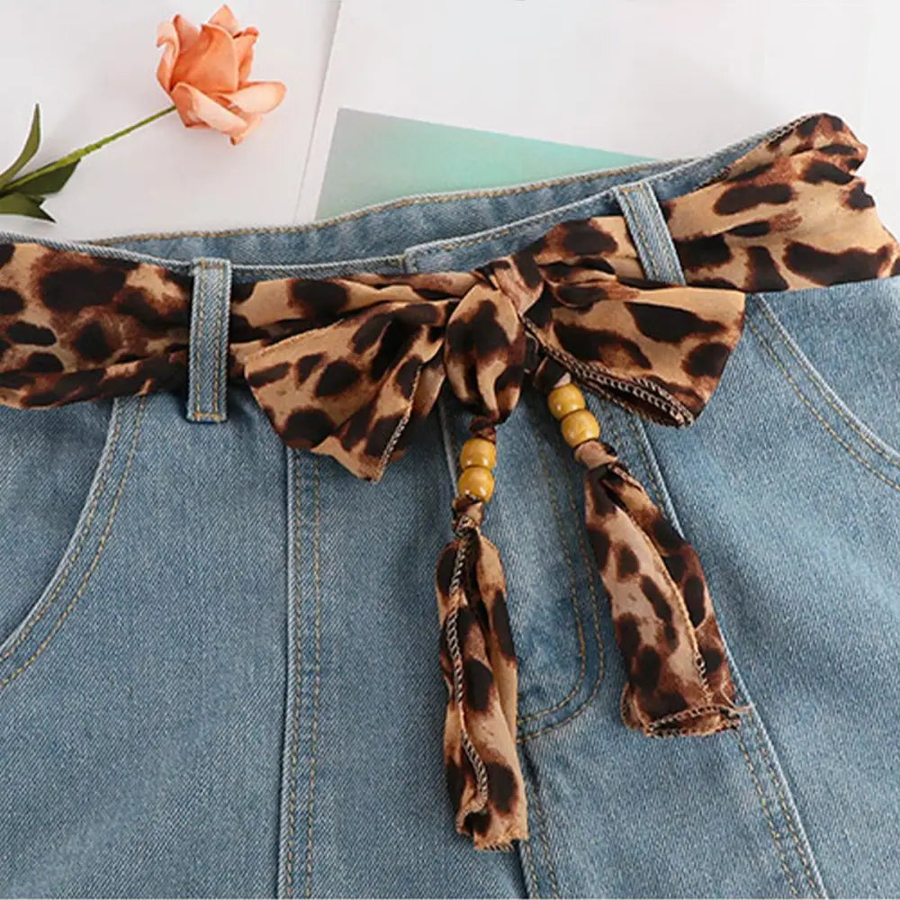 Denim skirt with leopard print belt and Hokoupadia model scarf belt accessory