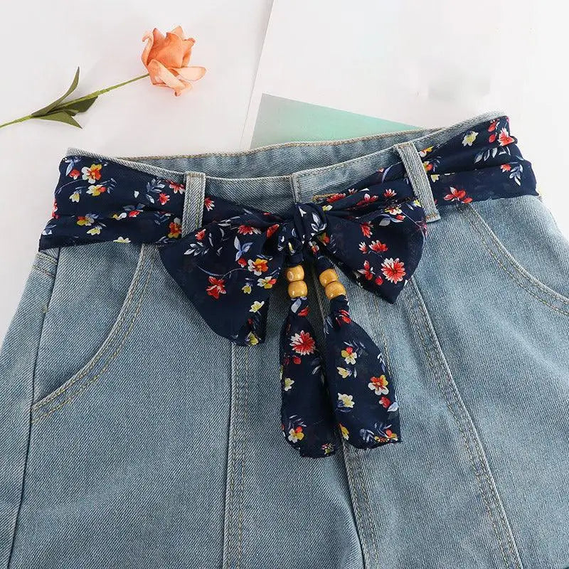 Denim shorts with floral scarf belt featuring Hokoupadia model scarf belt design