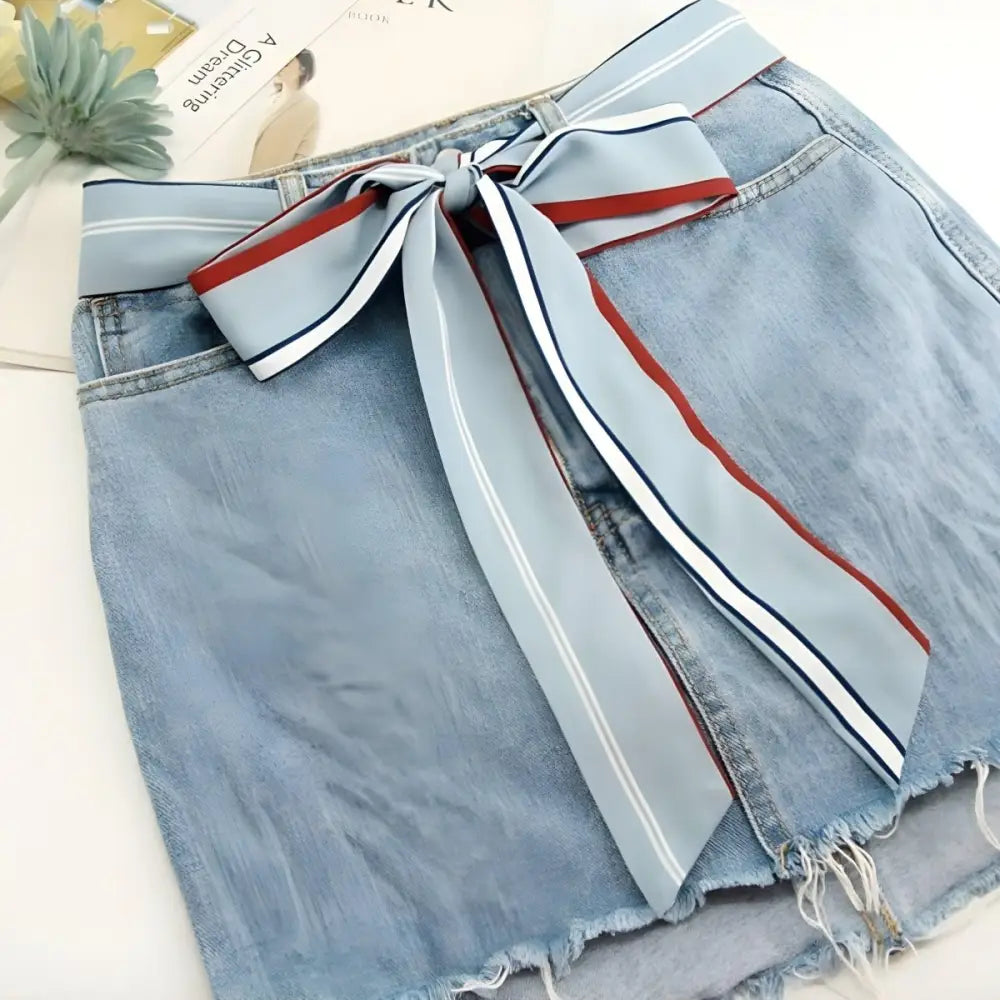 Denim skirt with ribbon belt and Sea Breeze Scarf accents for stylish fashion