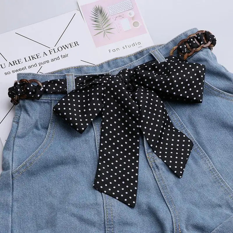 Blue denim skirt with Lisbeth scarf belt featuring polka dots and a polka dot belt