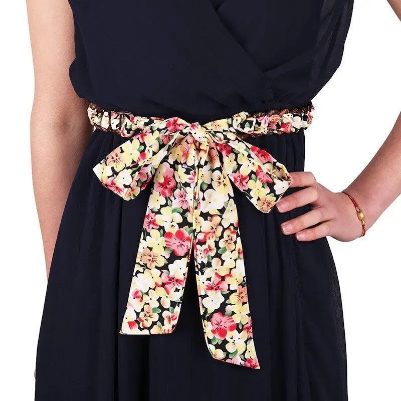 Navy floral silk scarf belt styled with an elegant navy dress for sophisticated fashion