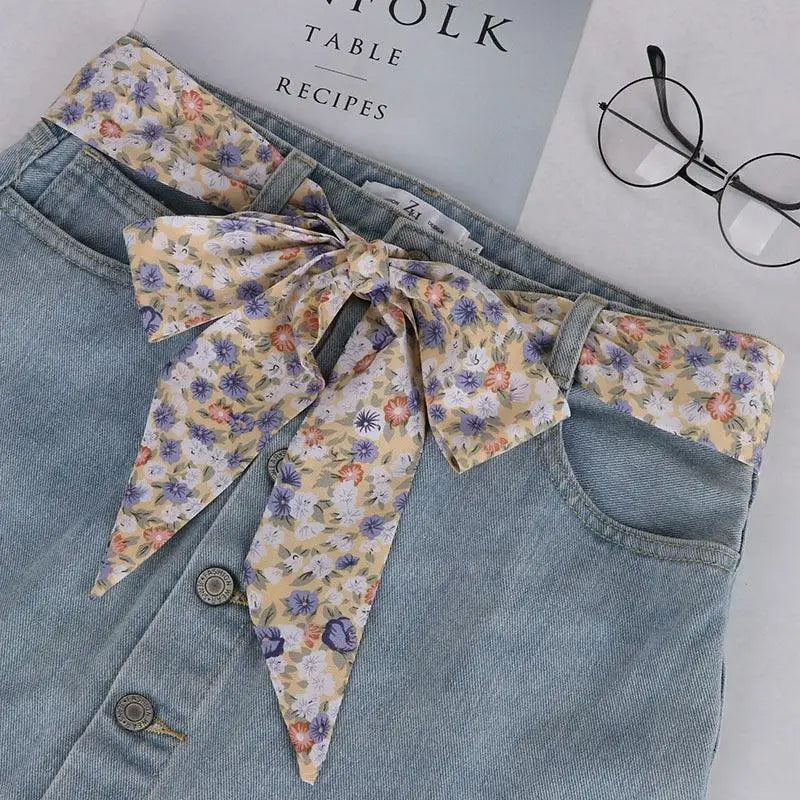 Denim skirt with floral sash and Yrsa silk scarf-belt for a feminine look