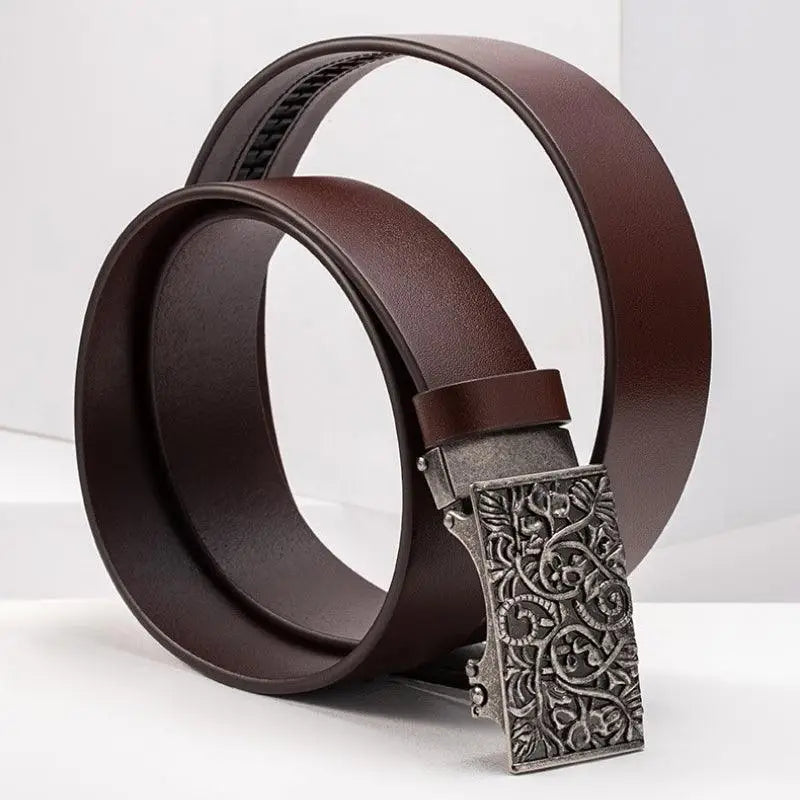 Large size brown leather belt with ornate western silver buckle for men