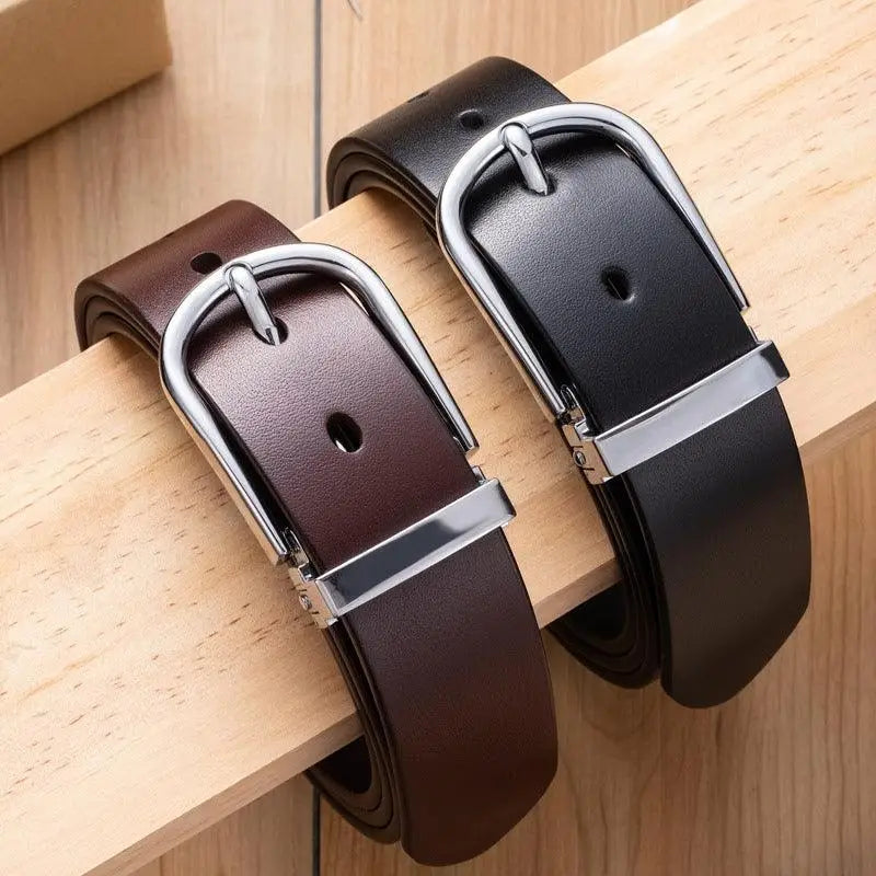 Two leather belts with silver buckles in black and brown options displayed for sale