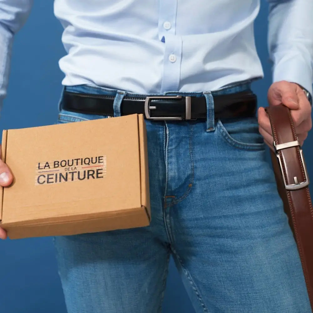 Man holding Winston Men’s Belt with Robust Metal Buckle in Brown Leather