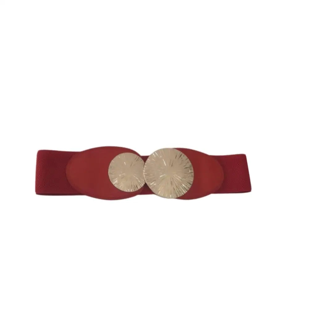 Red elastic belt with a gold circular buckle featured in the Elastic Belts collection
