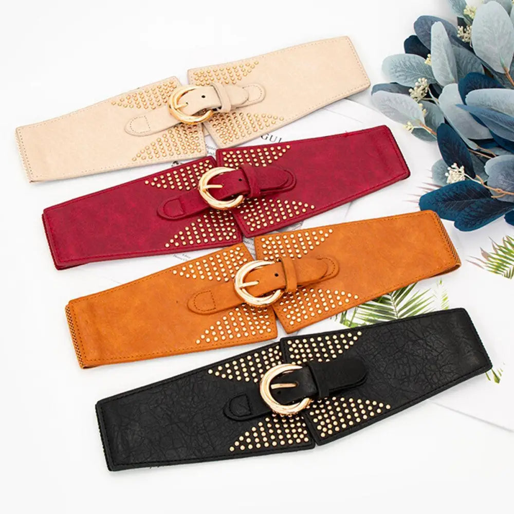 Four studded, wide elastic waist belts featured in Susanna Belt Red Patterned Dress collection