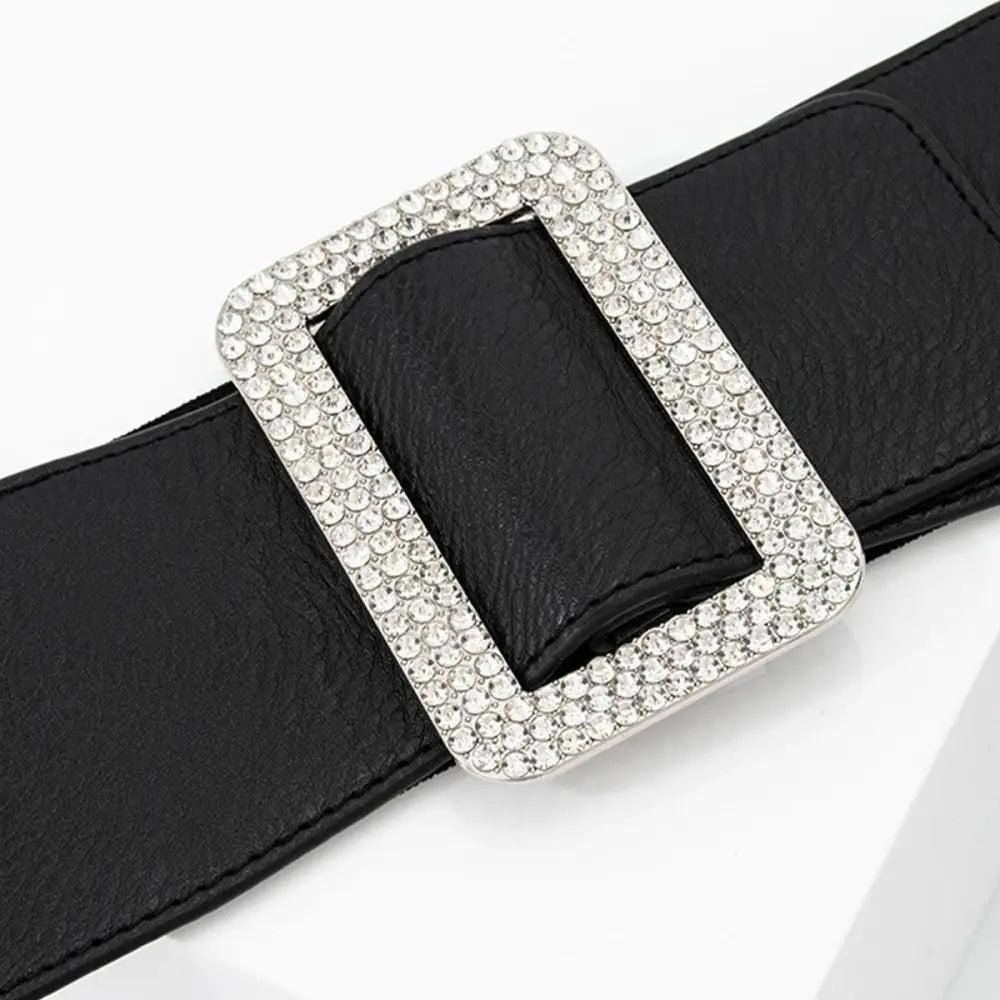 Elegant black belt with rhinestone buckle featured on the Satin Black Dress with Puff Sleeves and Eloisa Belt