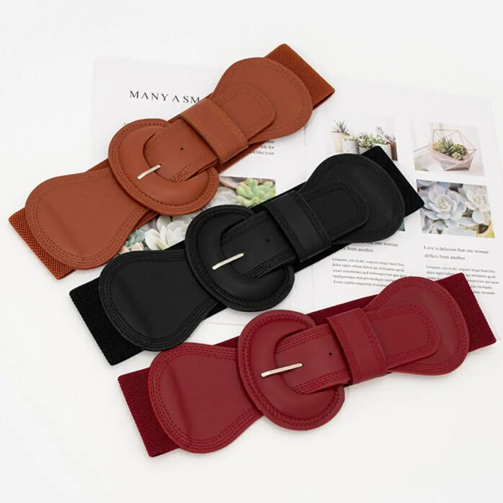 Alt text: Three elastic cinch belts from Nikoline Belt for stylish women’s outfits