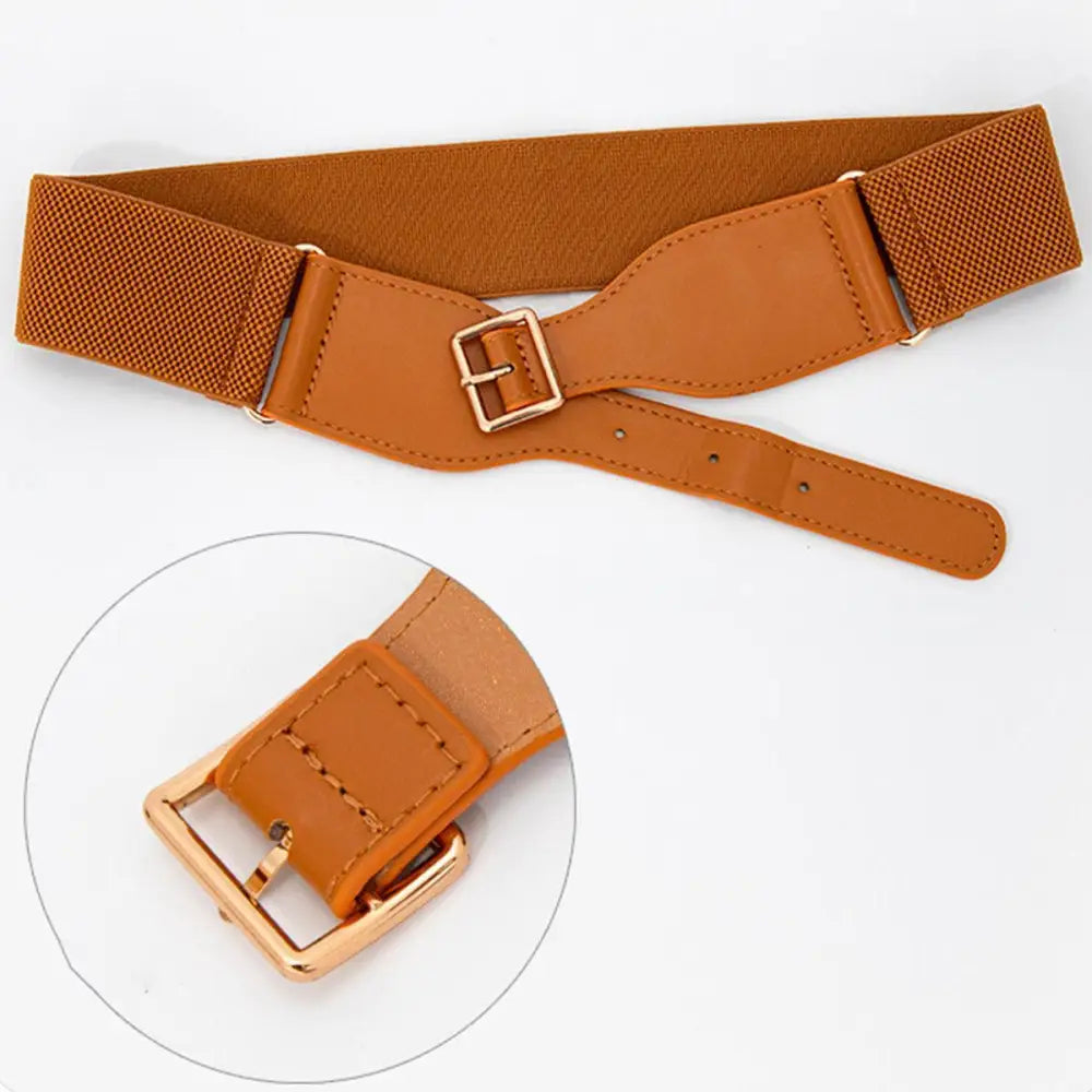 Brown elastic waist belt with gold buckle displayed with Green Dress and Osanna Belt