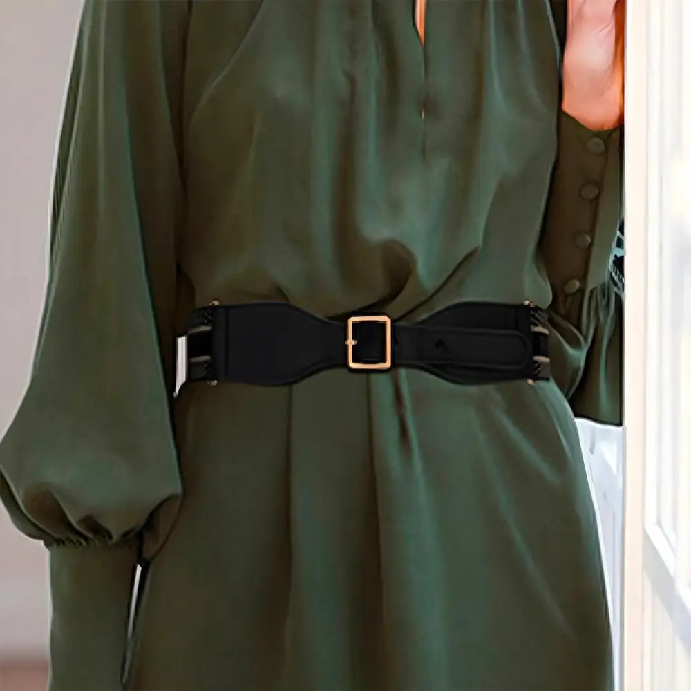 Green dress with Osanna belt and black waist belt for elegant stylish occasions