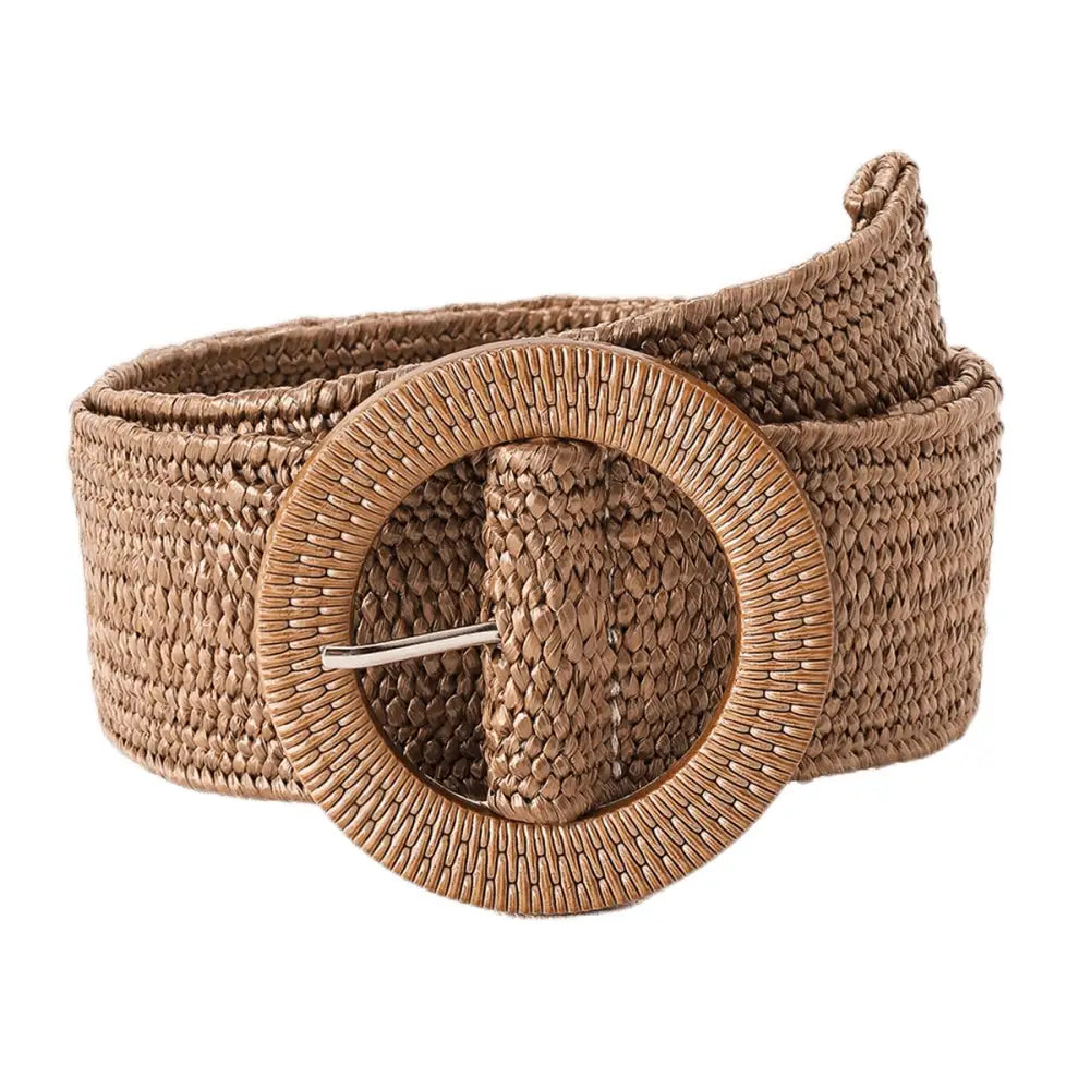 Woven Magdalini synthetic raffia belt with round buckle complementing floral one-shoulder top