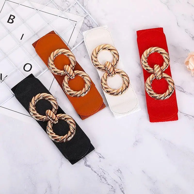 Elastic belts with gold double-ring buckles for women displayed in a stylish product image