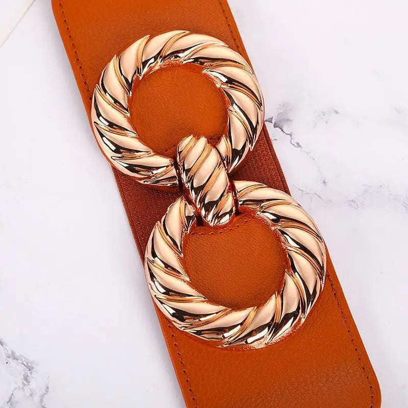 Orange elastic belt with gold twisted double-ring buckle for women