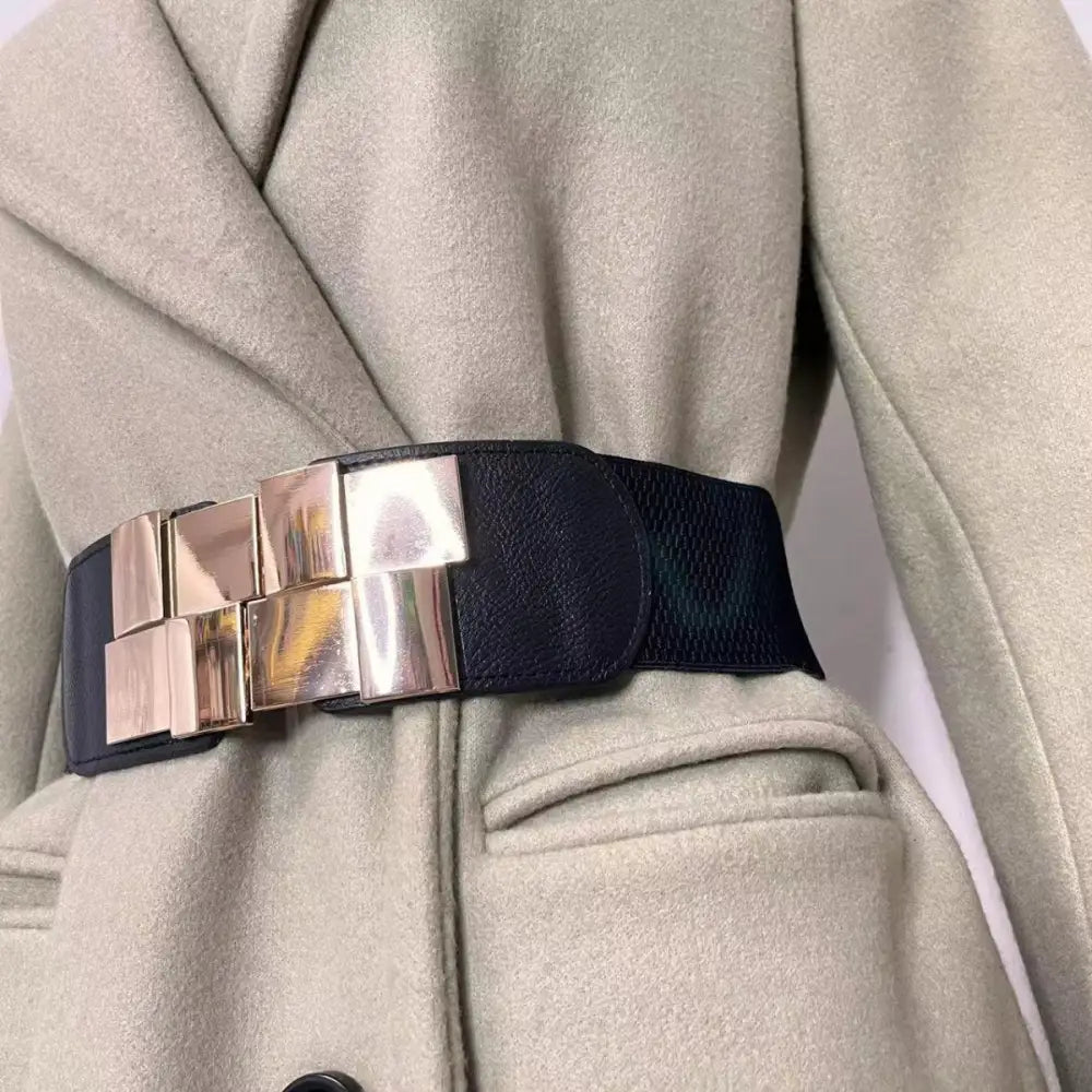 Black elastic belt with silver square accents from the Helene Belt collection
