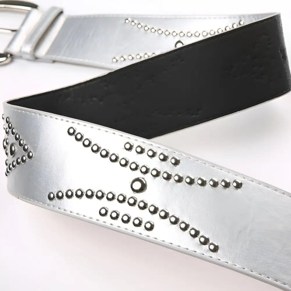 Silver studded belt displayed with Women’s Low-Rise Jeans and Camo Cargo Pants