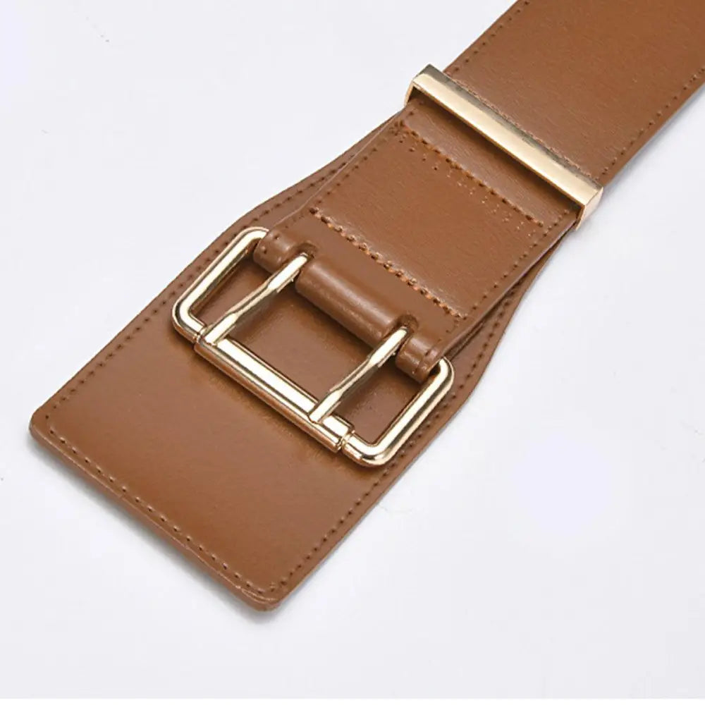 Brown faux leather belt with gold buckle displayed with Beige Turtleneck Sweater with Belts and Bag