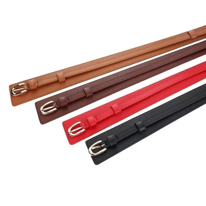 Four colorful leather belts with gold and silver buckles from the Bernice Belt collection