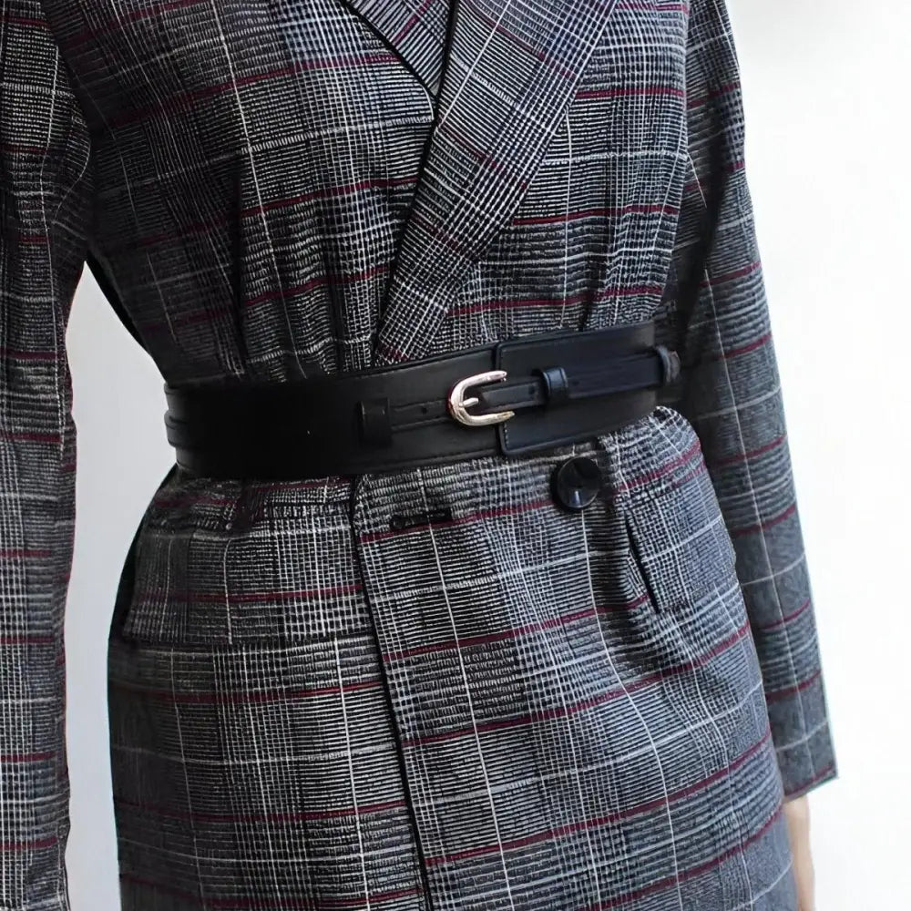 Plaid blazer cinched with a black belt featuring Bernice Belt Leather Straps with Gold and Silver Buckles