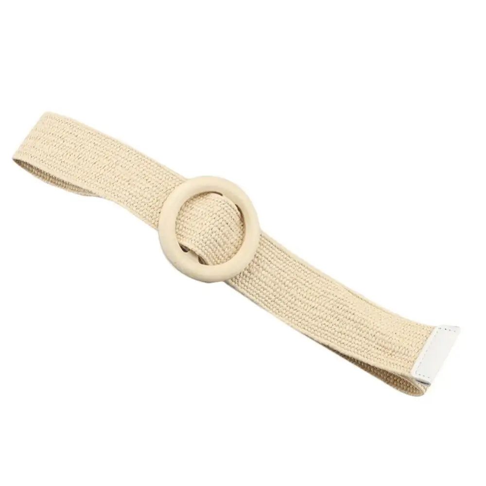 Beige woven carcui belt with circular wooden buckle for stylish accessories