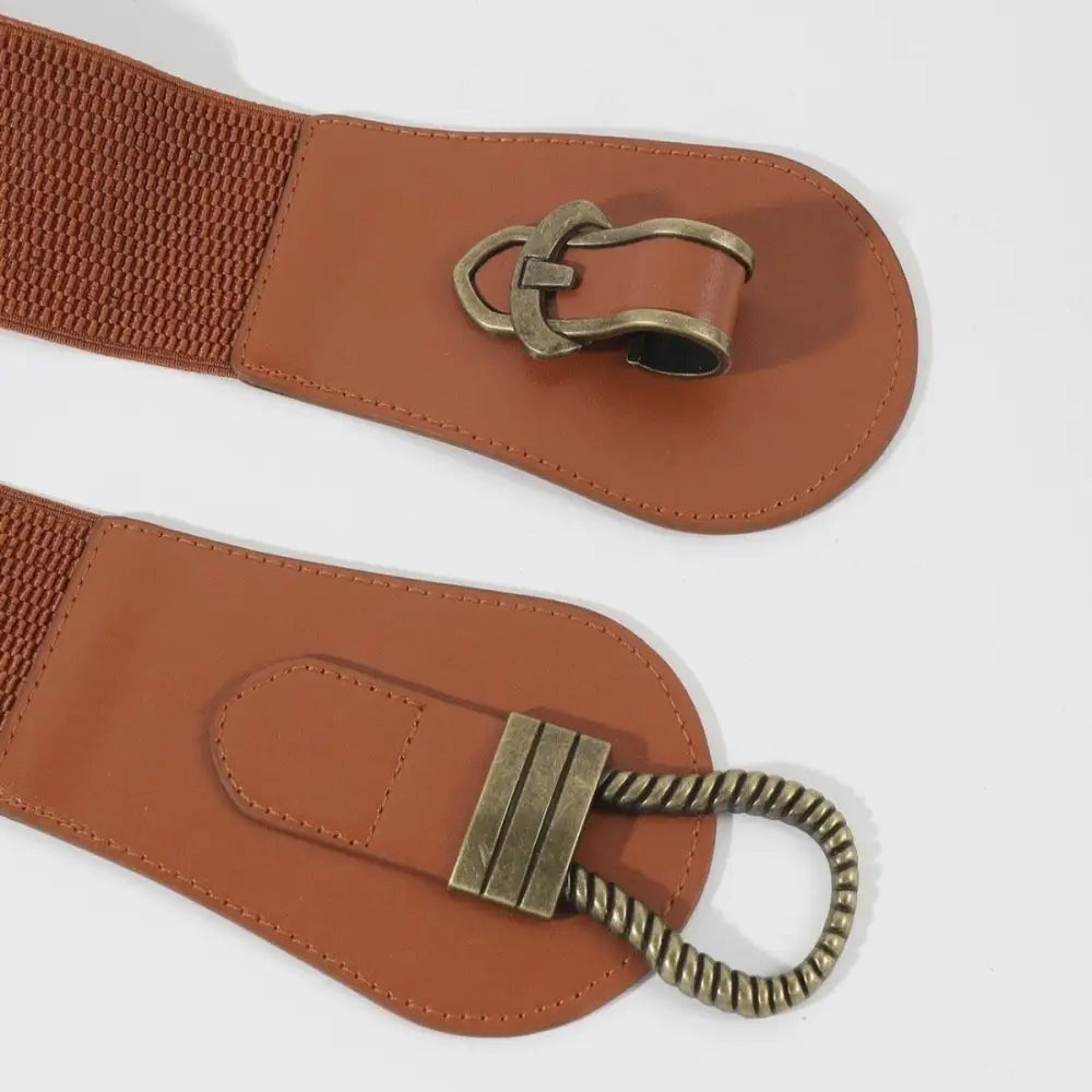 Brown elastic belt with a metal buckle from Brown and Black Elastic and Leather Waist Belts